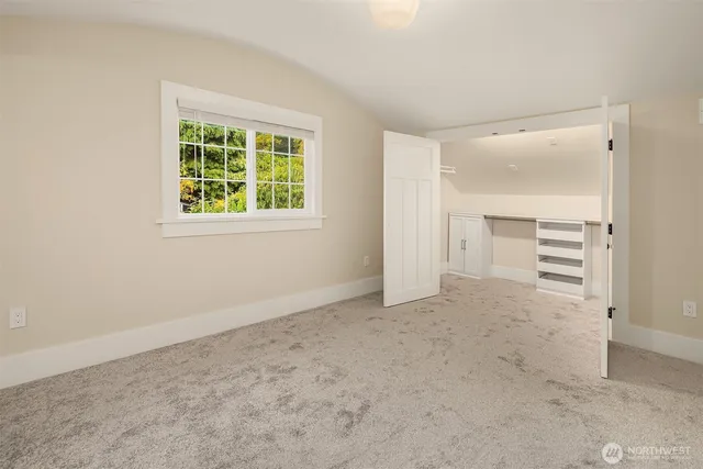 a view of an empty walk in closet