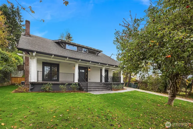 a front view of a house with a garage