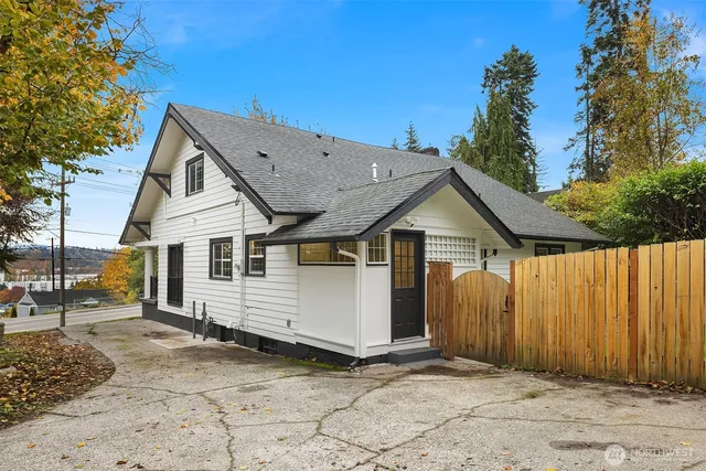 a view of a field with trees in front of it