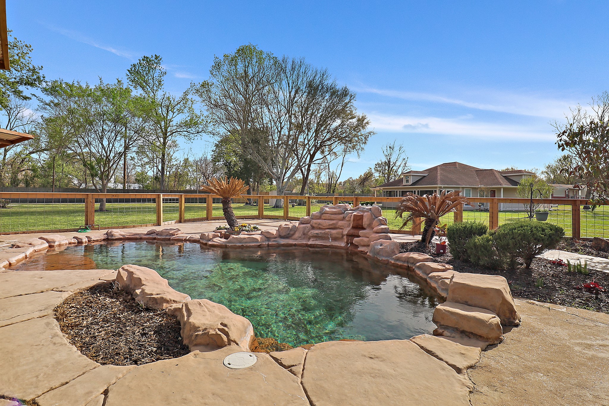 15321 Lindstrom Road Crosby, TX 77532 - Photo 26 of 50 a view of a swimming pool with a patio