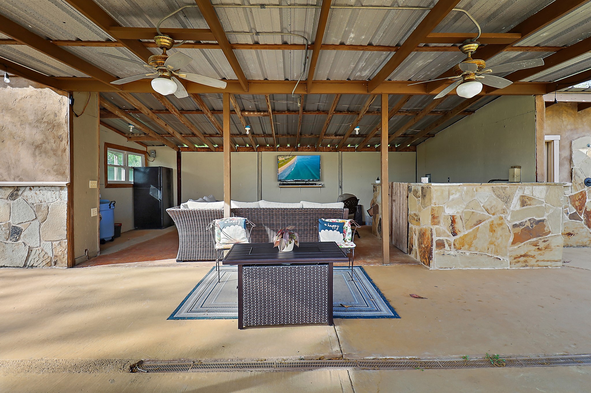 15321 Lindstrom Road Crosby, TX 77532 - Photo 28 of 50 a view of a patio with a table and chairs