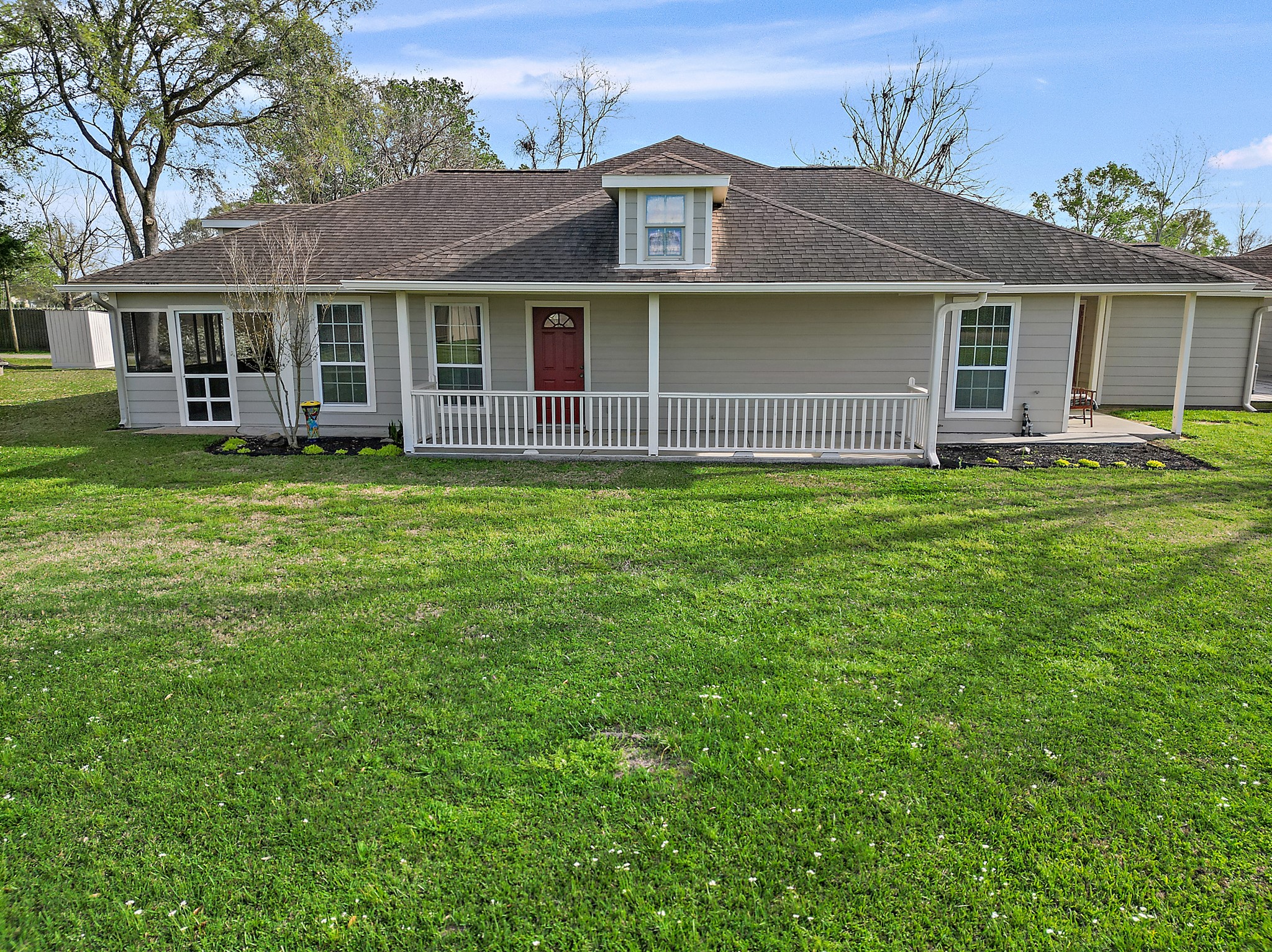 15321 Lindstrom Road Crosby, TX 77532 - Photo 31 of 50 a front view of a house with a garden