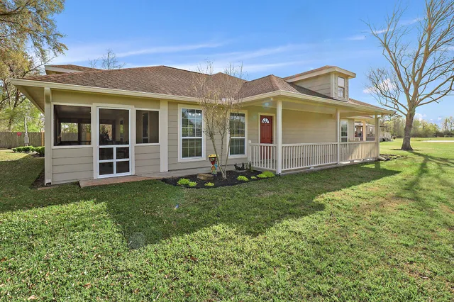 front view of a house with a yard