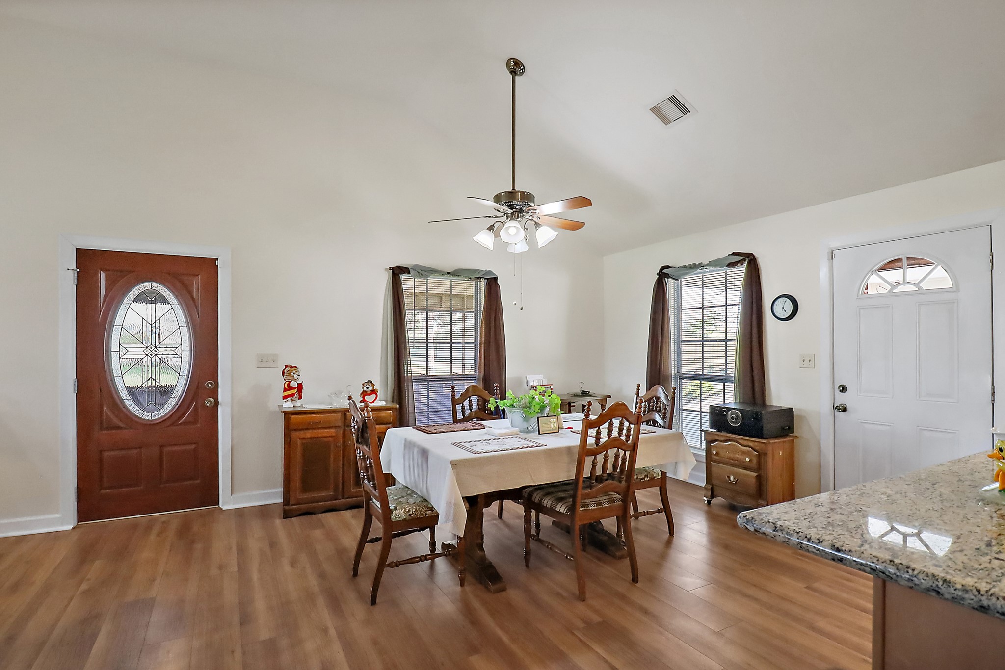 15321 Lindstrom Road Crosby, TX 77532 - Photo 37 of 50 a view of a dining room with furniture and wooden floor