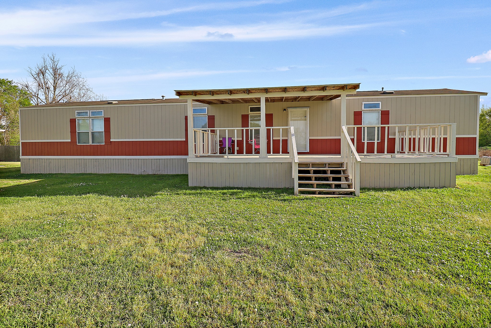 15321 Lindstrom Road Crosby, TX 77532 - Photo 47 of 50 a front view of a house with a garden