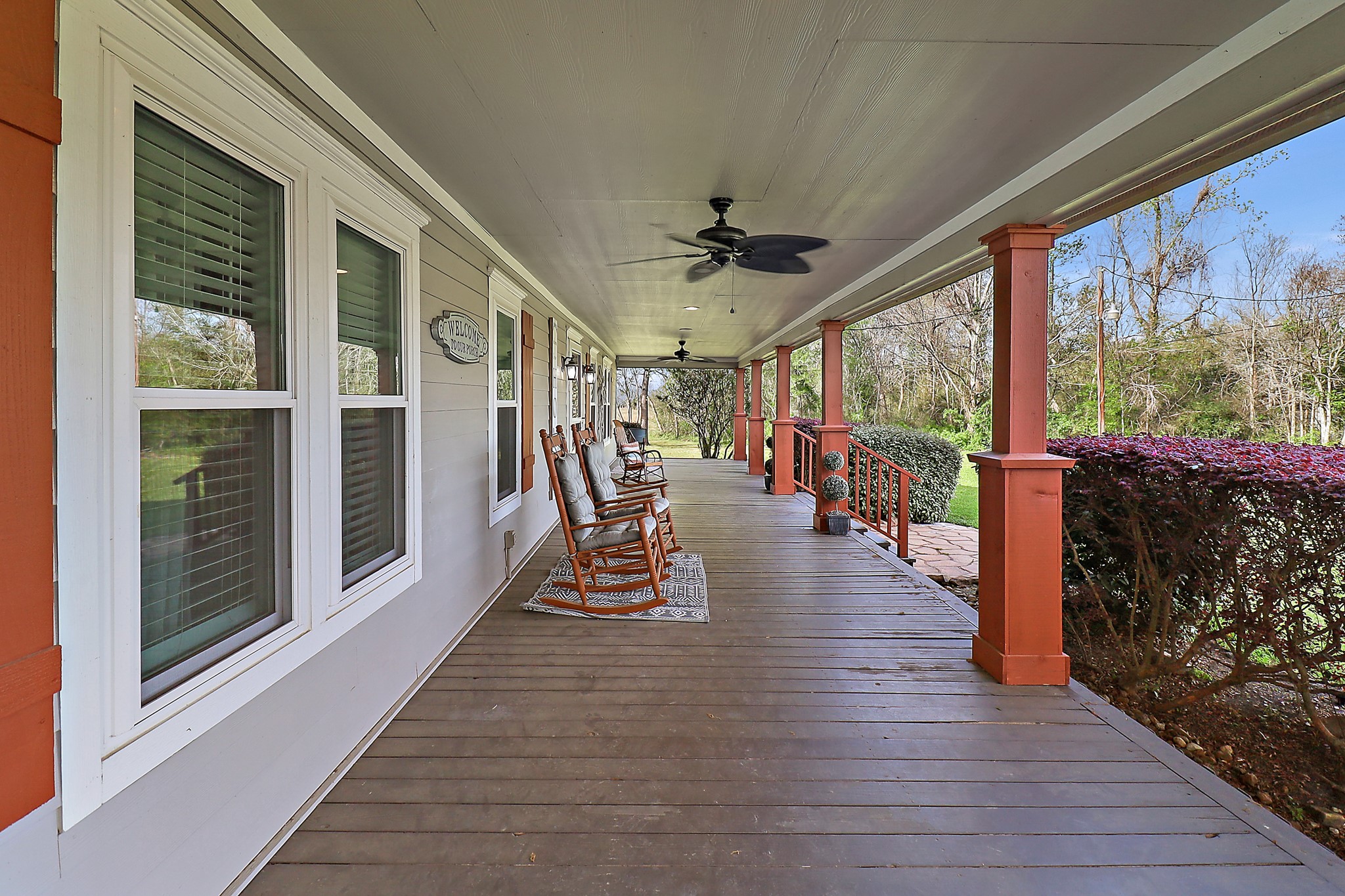15321 Lindstrom Road Crosby, TX 77532 - Photo 5 of 50 a hallway with wooden floor and large windows