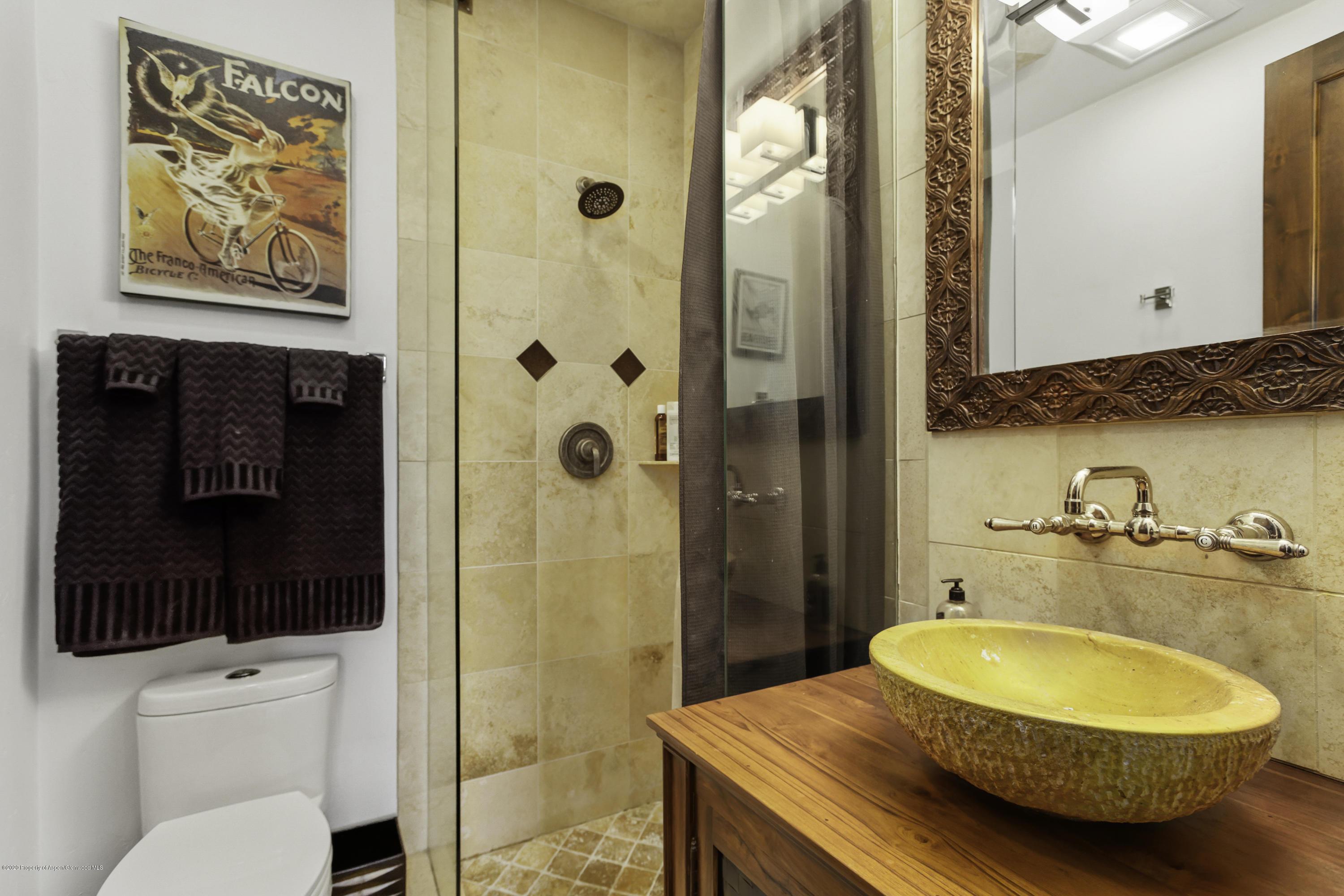 23272 2 Rivers Road, Unit 301 Basalt, CO 81621 - Photo 8 of 16 a bathroom with a sink and a mirror