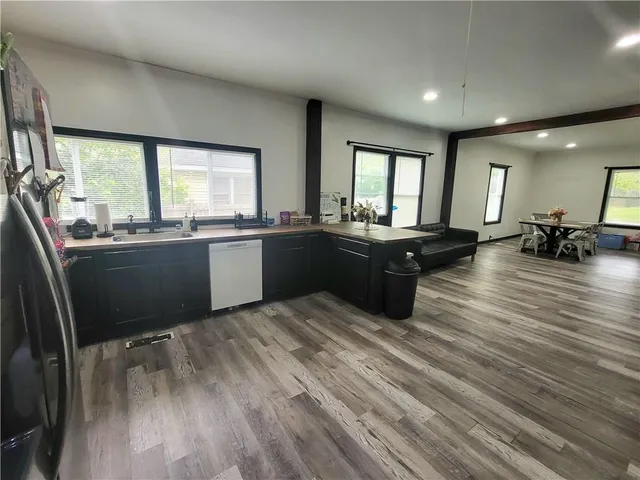 a kitchen with granite countertop lots of counter top space