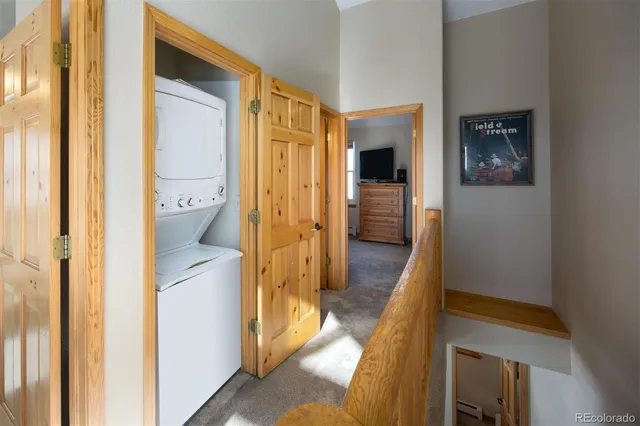 a view of a bathroom from a hallway