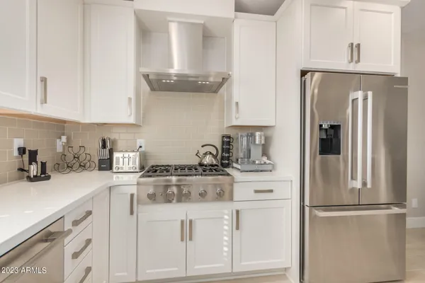 a kitchen with a sink and a window