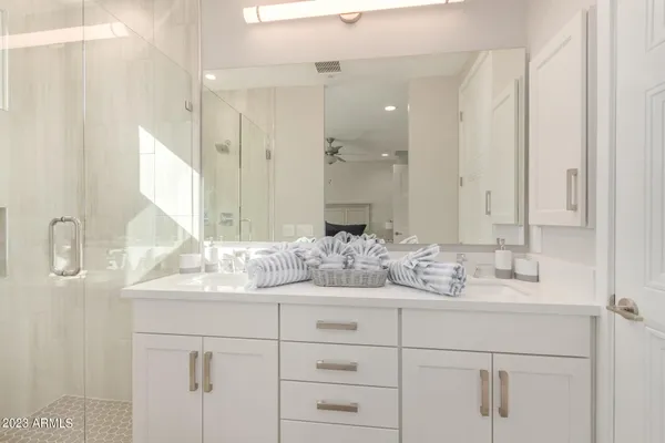 a view of a room with rack on the wall and a window