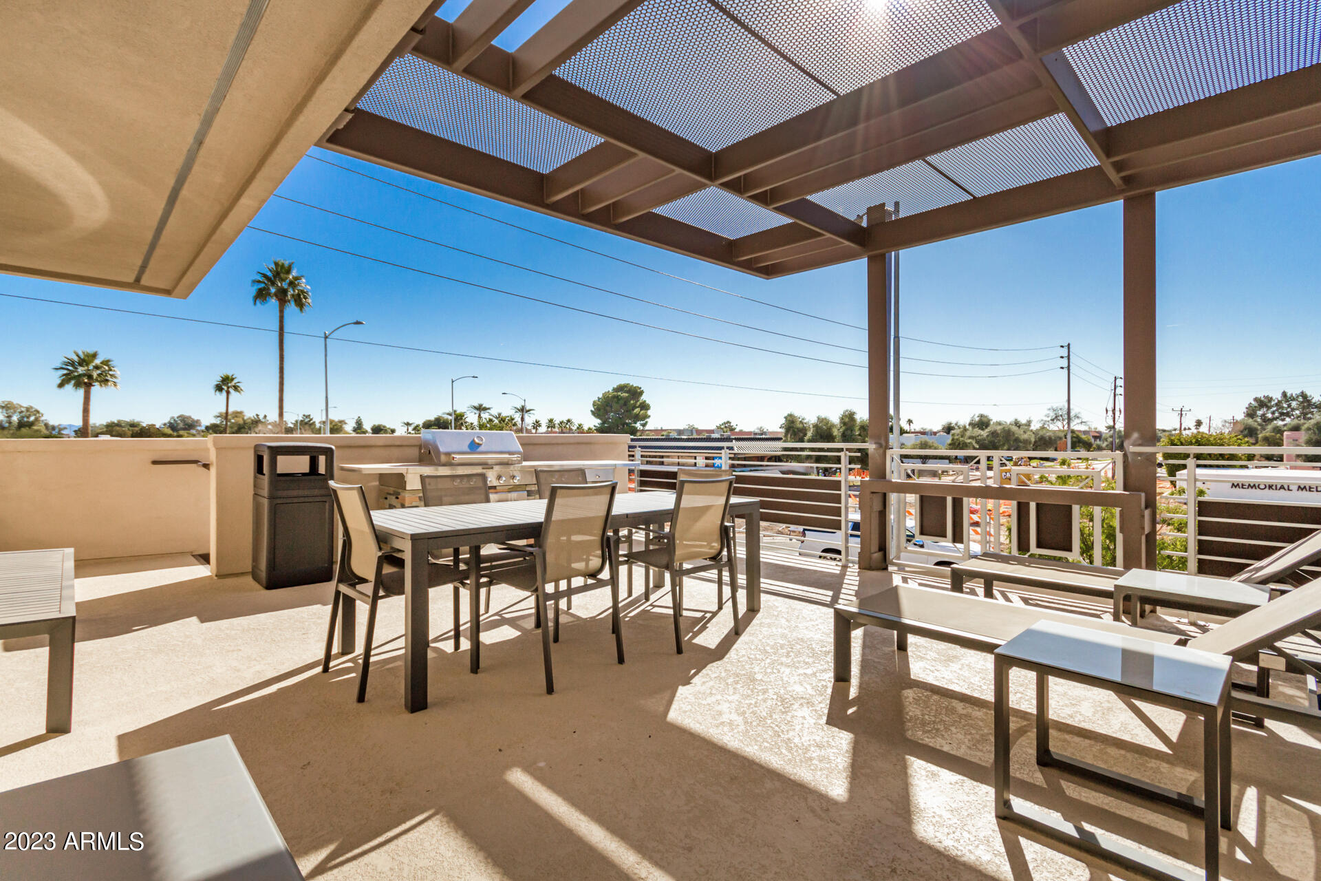 7550 East Osborn Road, Unit 1009 Scottsdale, AZ 85251 - Photo 37 of 39 a view of a dining room with furniture and chandelier