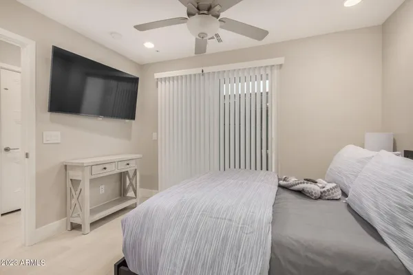 a view of bathroom with a sink mirror and toilet