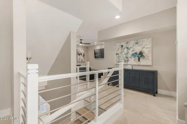 a view of a kitchen with furniture and an empty room