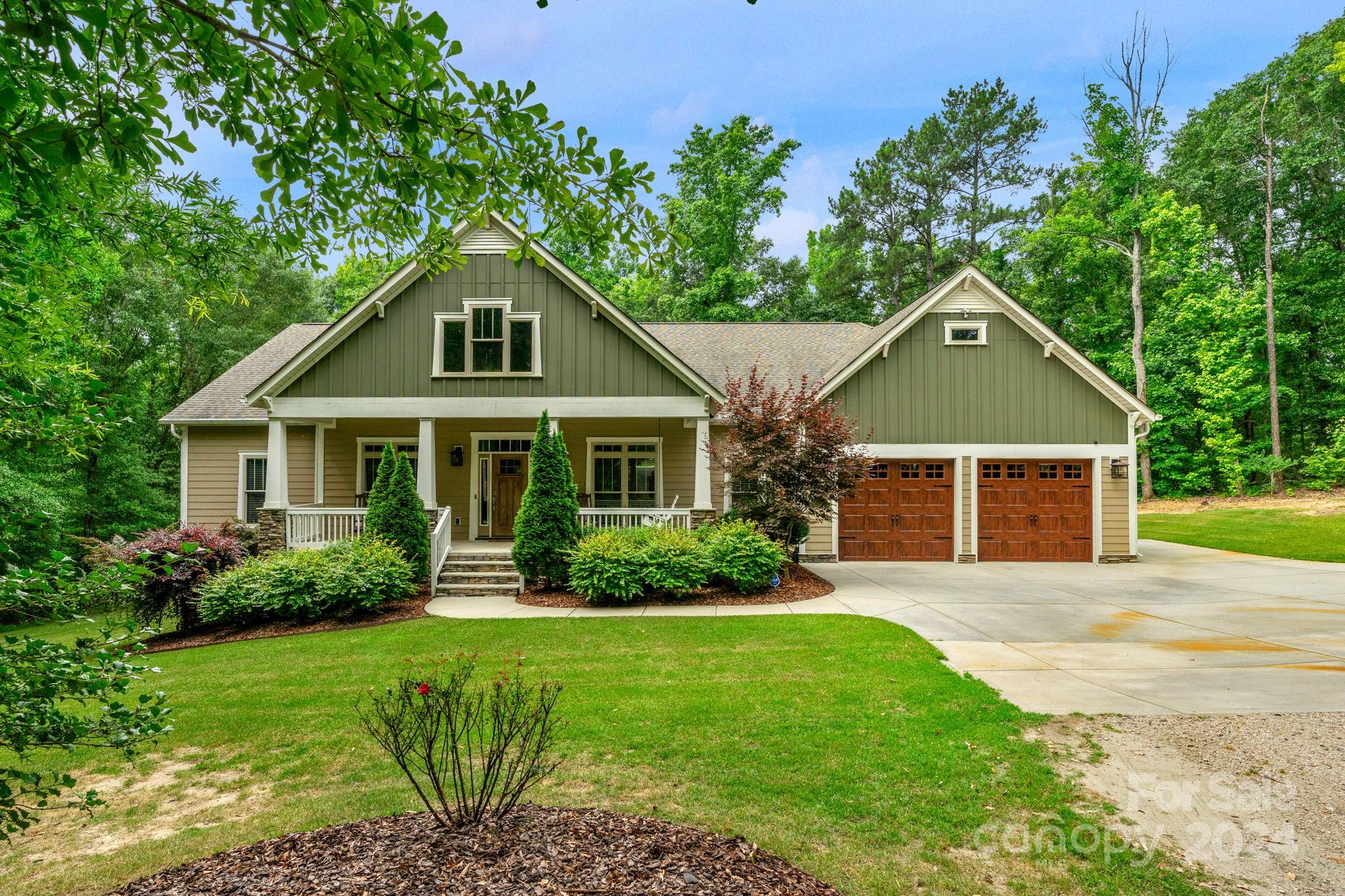 206 Niven Road Lancaster, SC 29720 - Photo 1 of 44 a front view of a house with a yard and porch