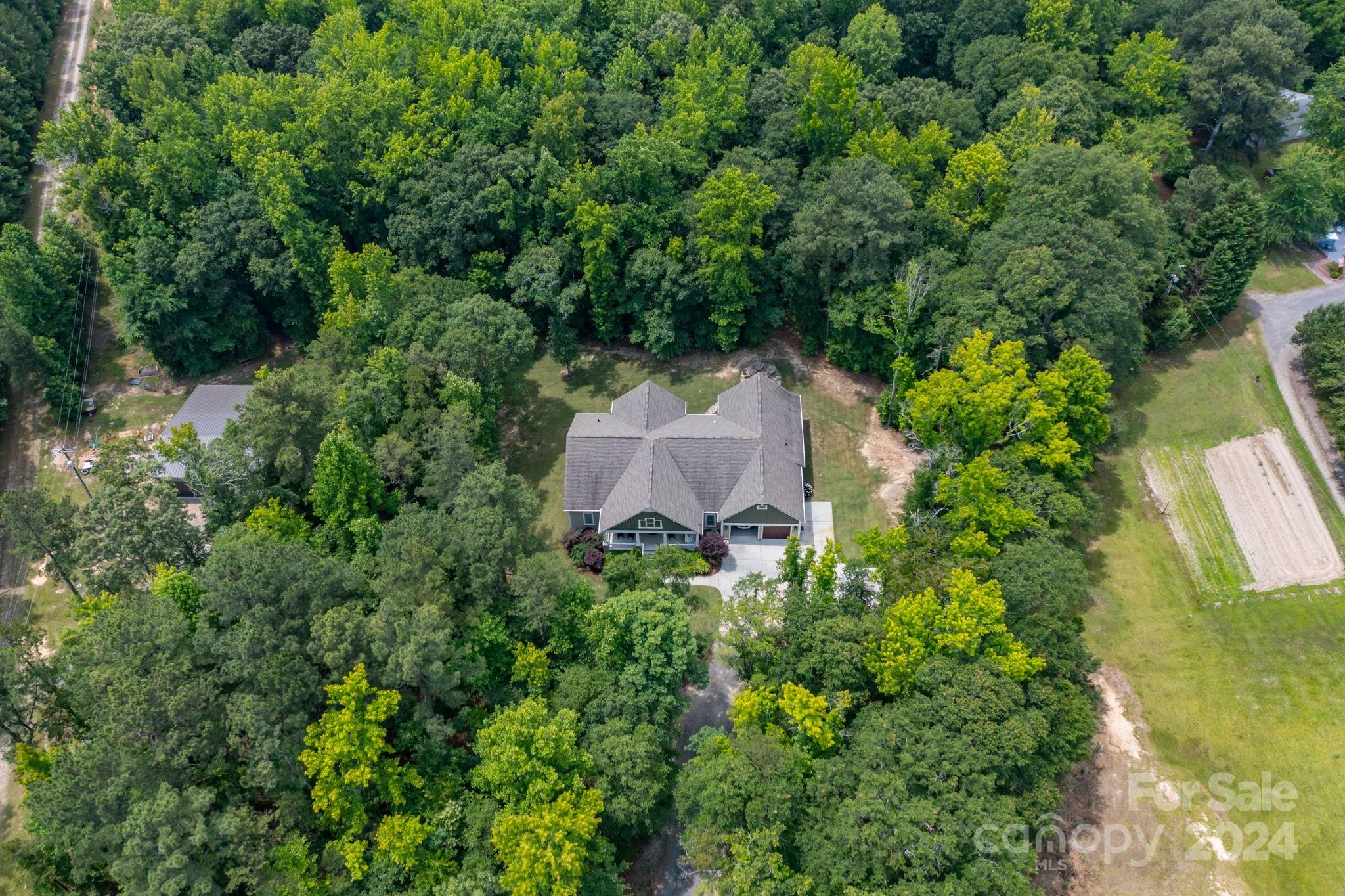 206 Niven Road Lancaster, SC 29720 - Photo 2 of 44 an aerial view of house with yard and outdoor seating