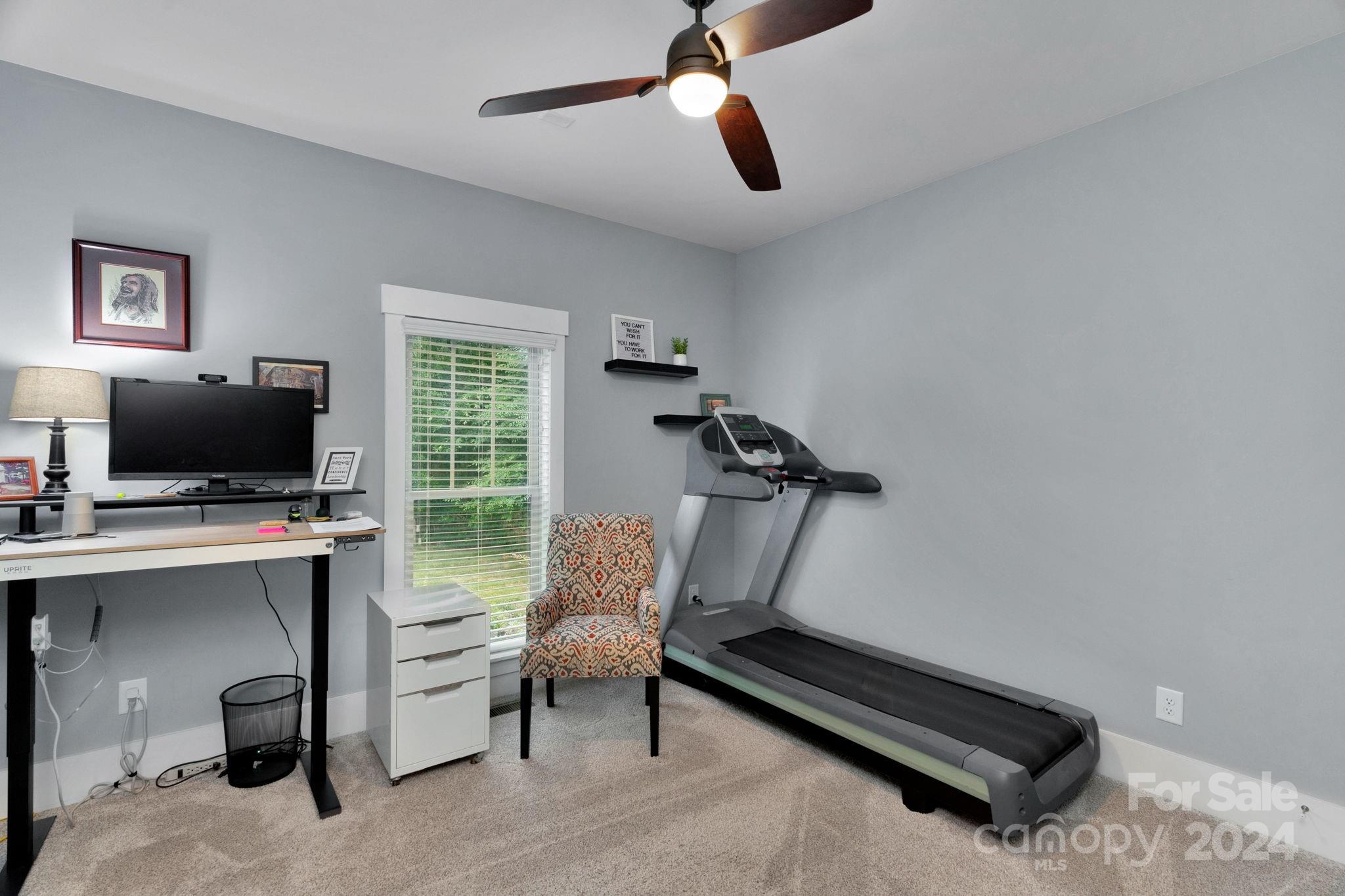 206 Niven Road Lancaster, SC 29720 - Photo 28 of 44 a living room with furniture and a flat screen tv