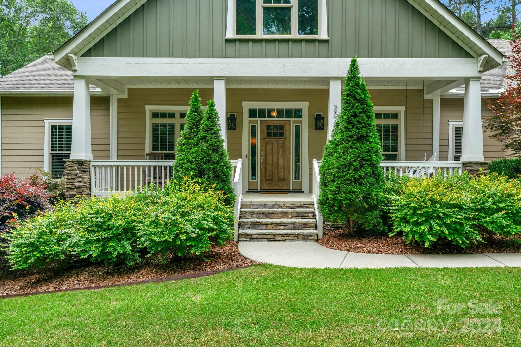 206 Niven Road Lancaster, SC 29720 - Photo 6 of 44 front view of a house with a yard