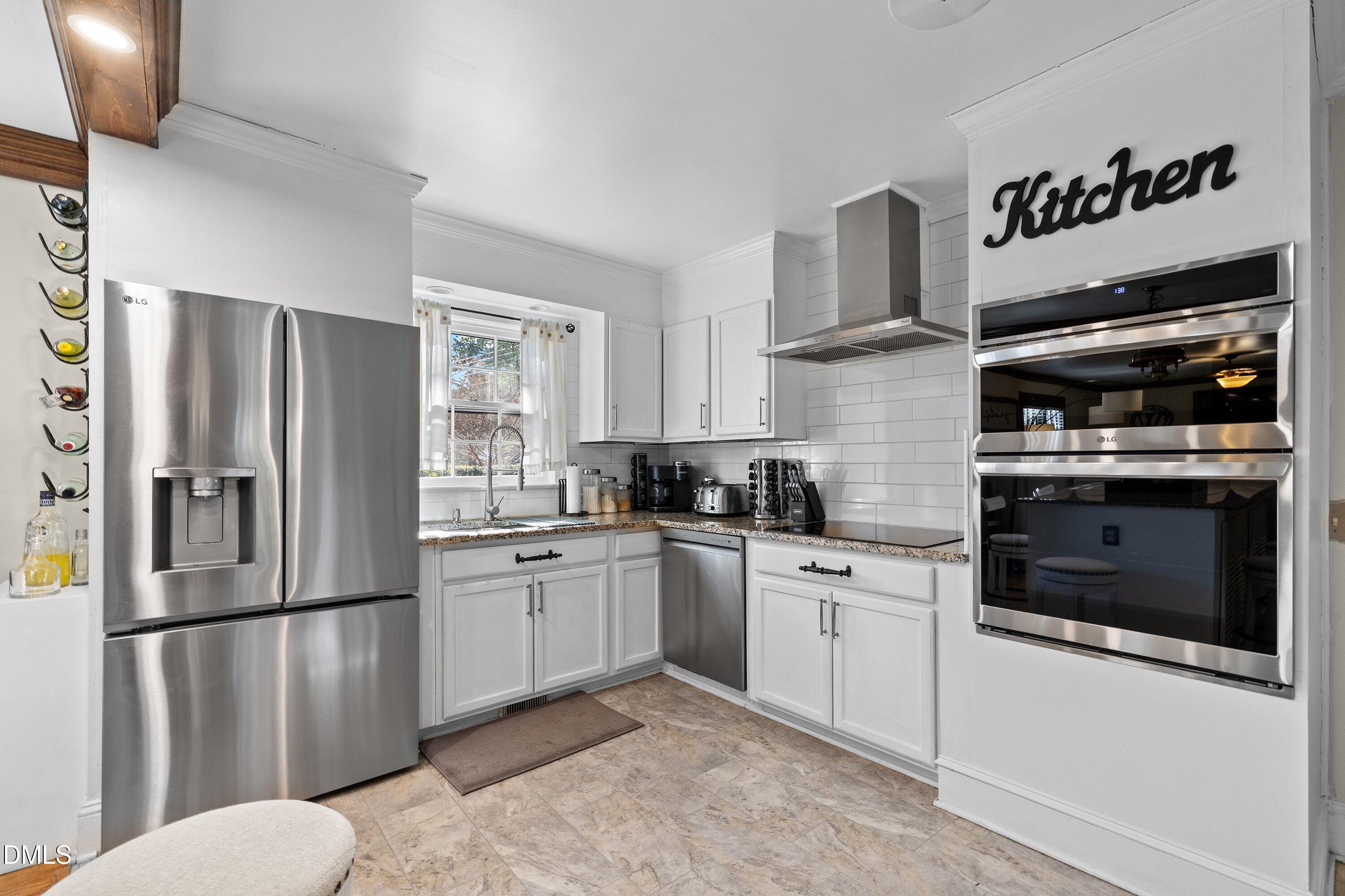 3329 Winstead Road Rocky Mount, NC 27804 - Photo 11 of 37 a kitchen with stainless steel appliances granite countertop a refrigerator sink and stove