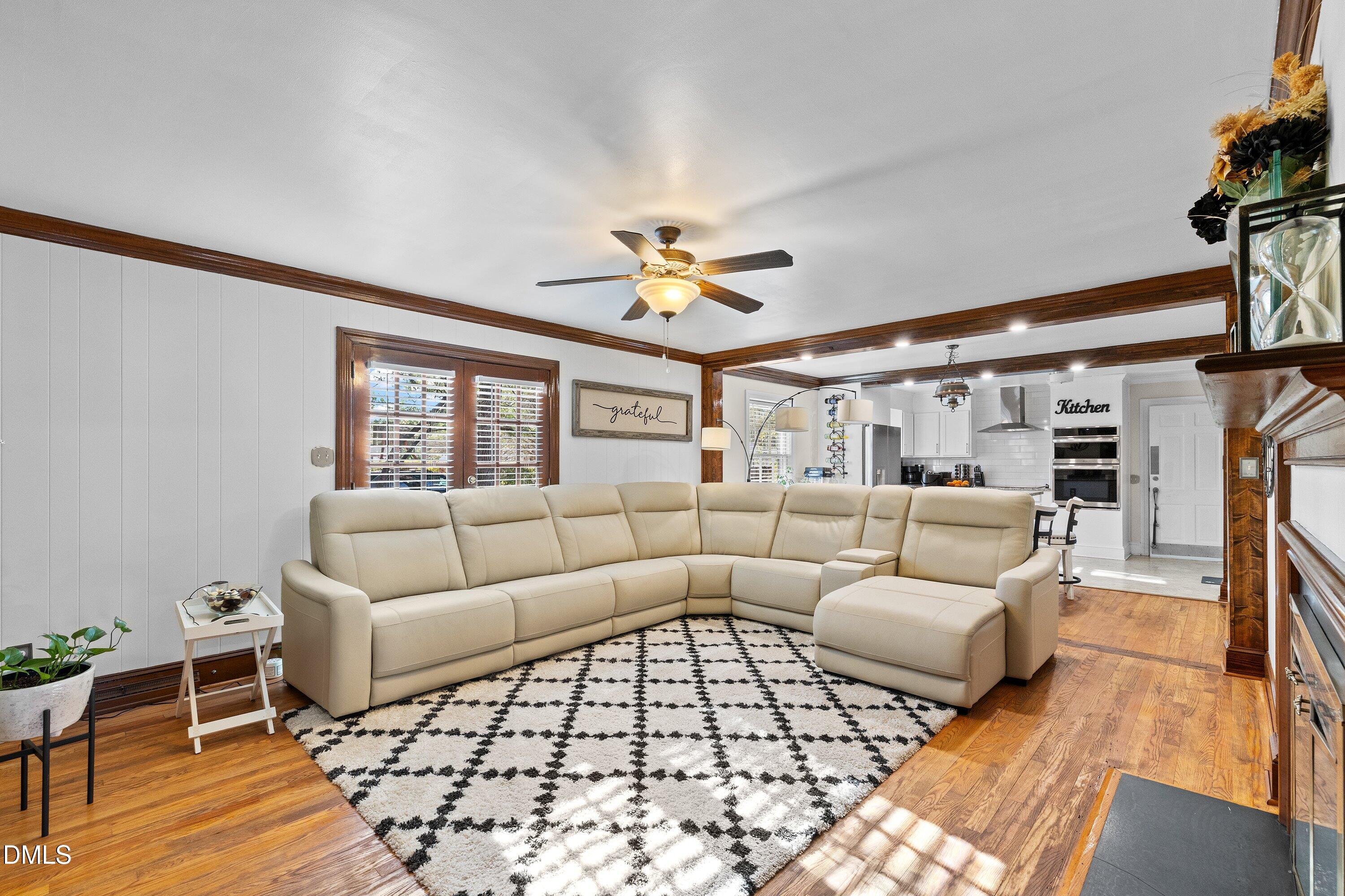 3329 Winstead Road Rocky Mount, NC 27804 - Photo 17 of 37 a living room with furniture and a large window
