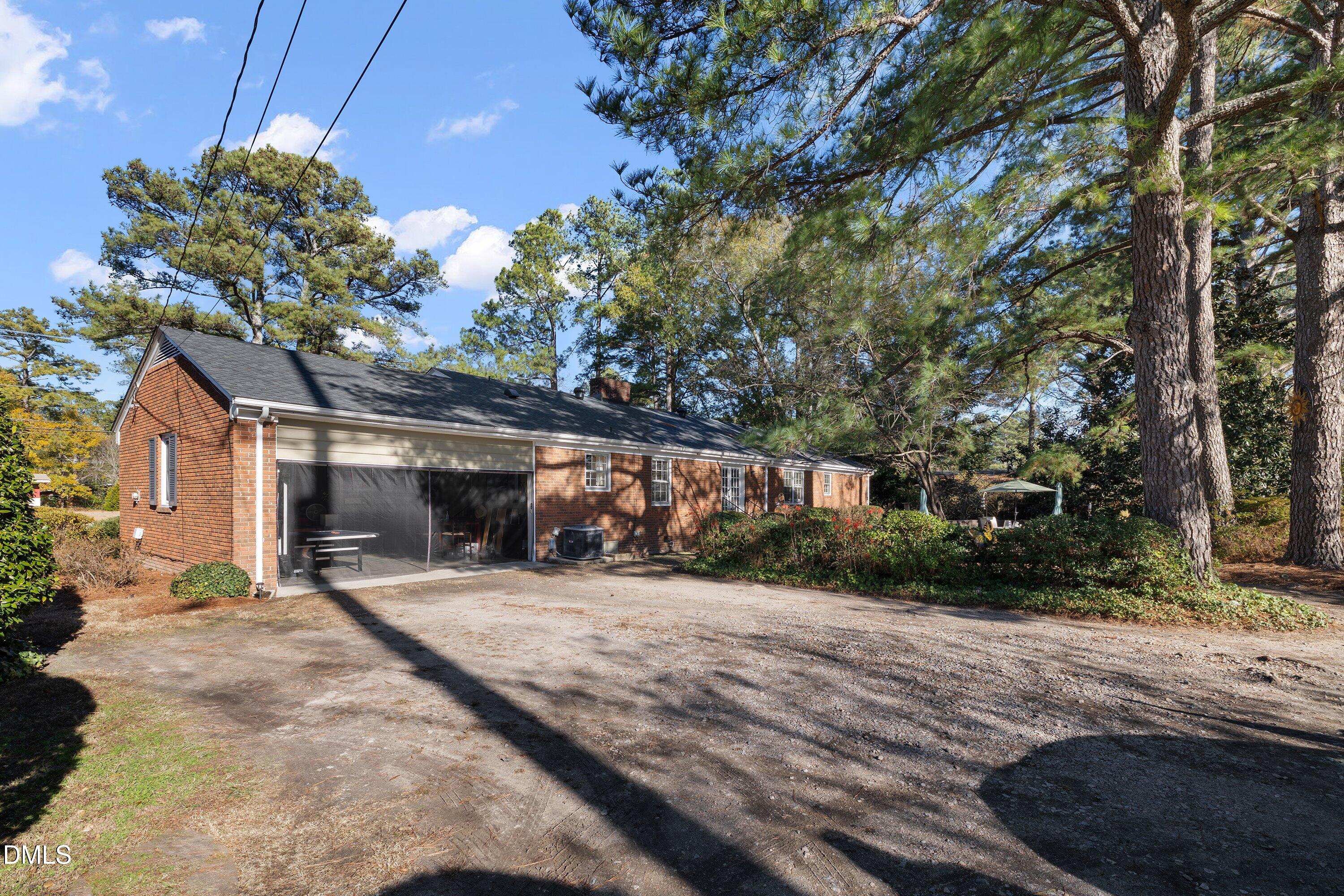 3329 Winstead Road Rocky Mount, NC 27804 - Photo 35 of 37 a view of a house with a yard