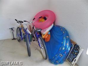 3985 Deer Crossing Court, Unit 201 Naples, FL 34114 - Photo 22 of 24 a view of a room with gym equipment
