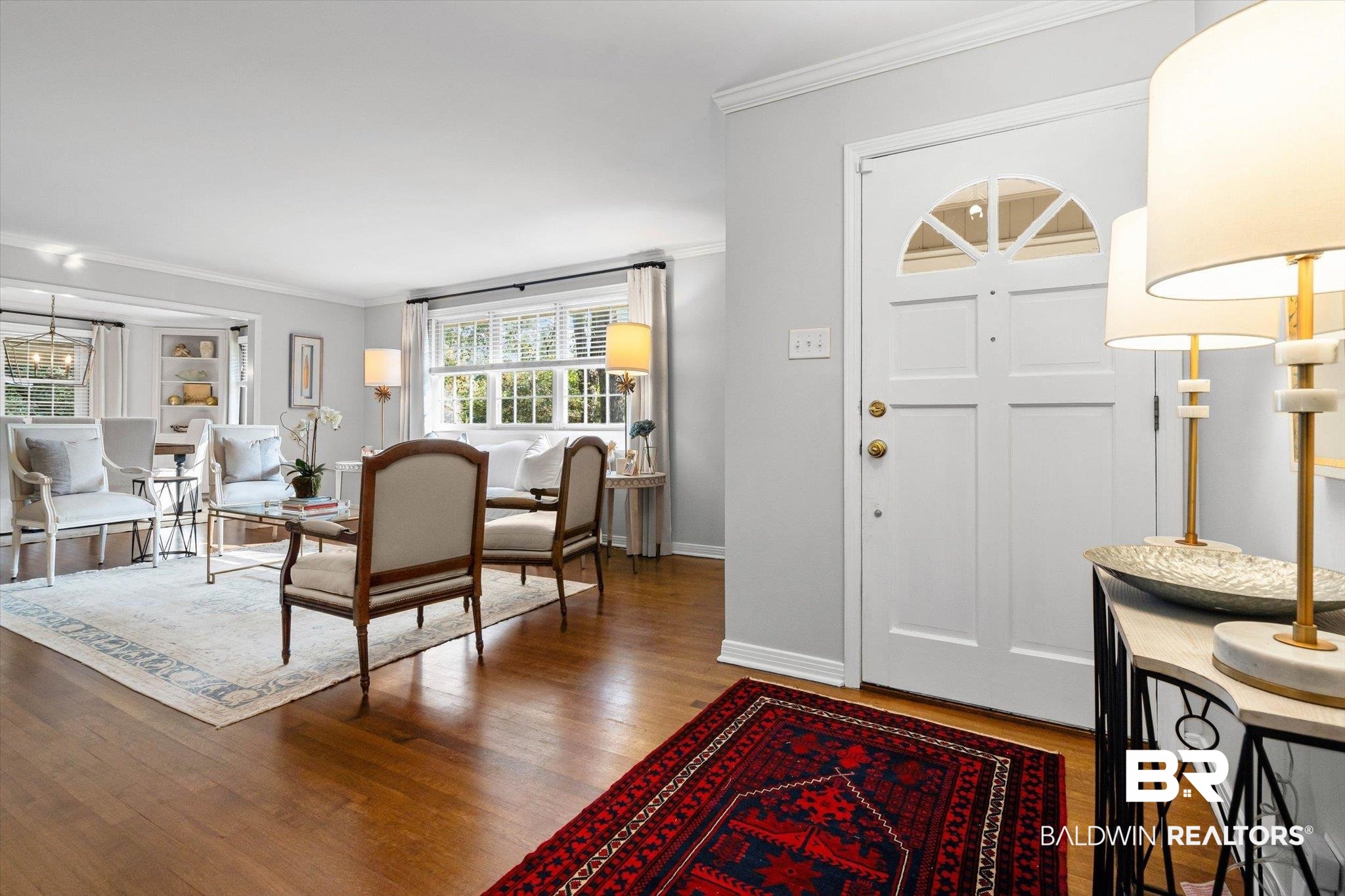 313 Brawood Drive Mobile, AL 36608 - Photo 2 of 32 Foyer entrance with crown molding and wood finished floors