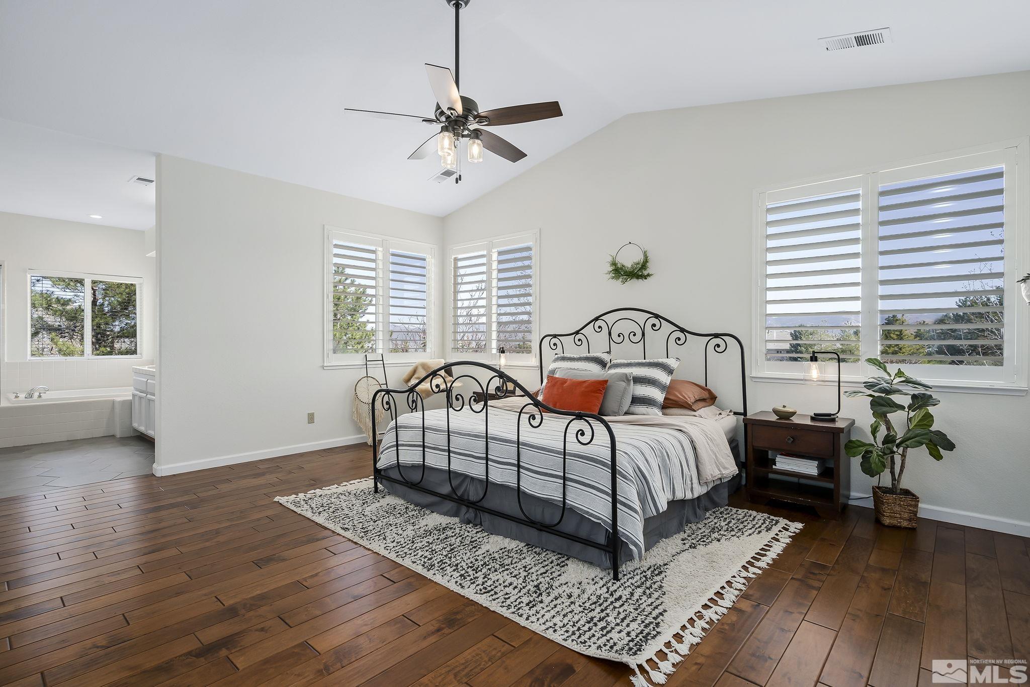 5016 East Albuquerque Road Reno, NV 89511 - Photo 21 of 38 a bedroom with furniture and a window