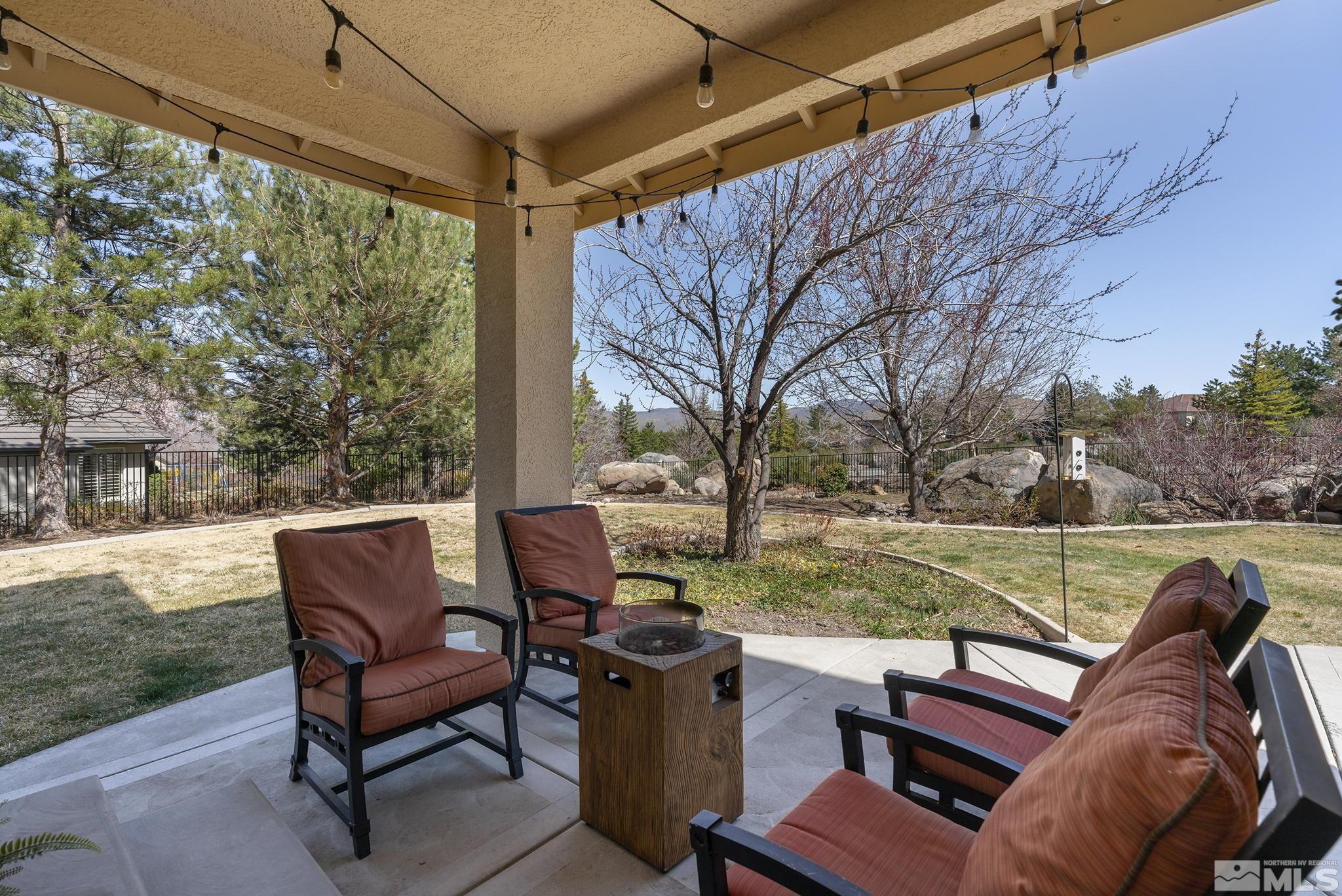 5016 East Albuquerque Road Reno, NV 89511 - Photo 29 of 38 a view of a yard with furniture and a backyard