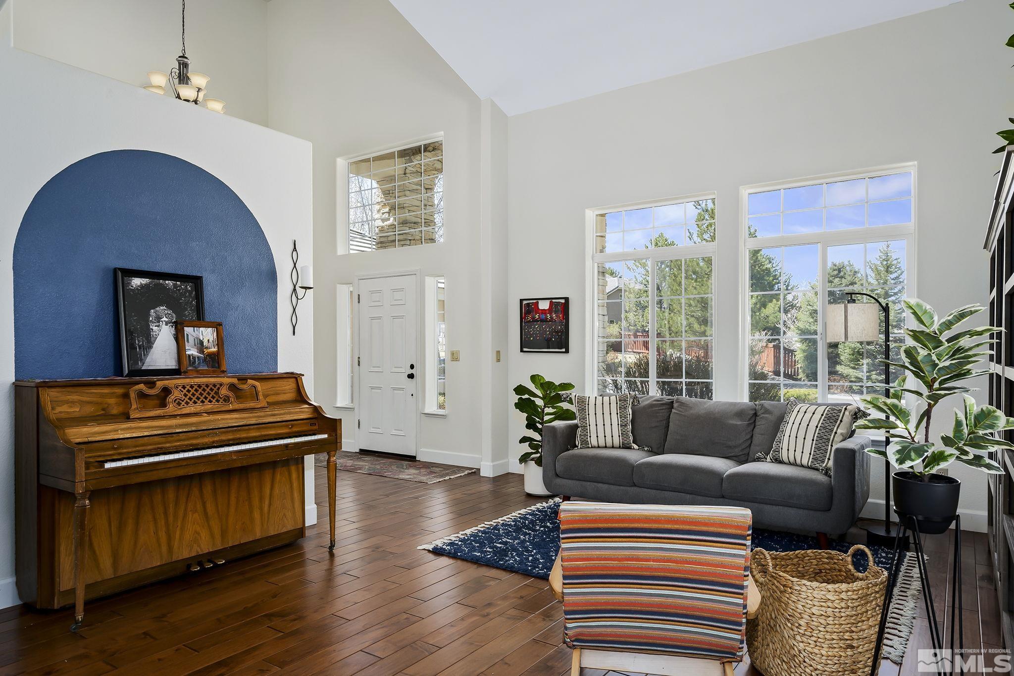 5016 East Albuquerque Road Reno, NV 89511 - Photo 5 of 38 a living room with furniture and a fireplace