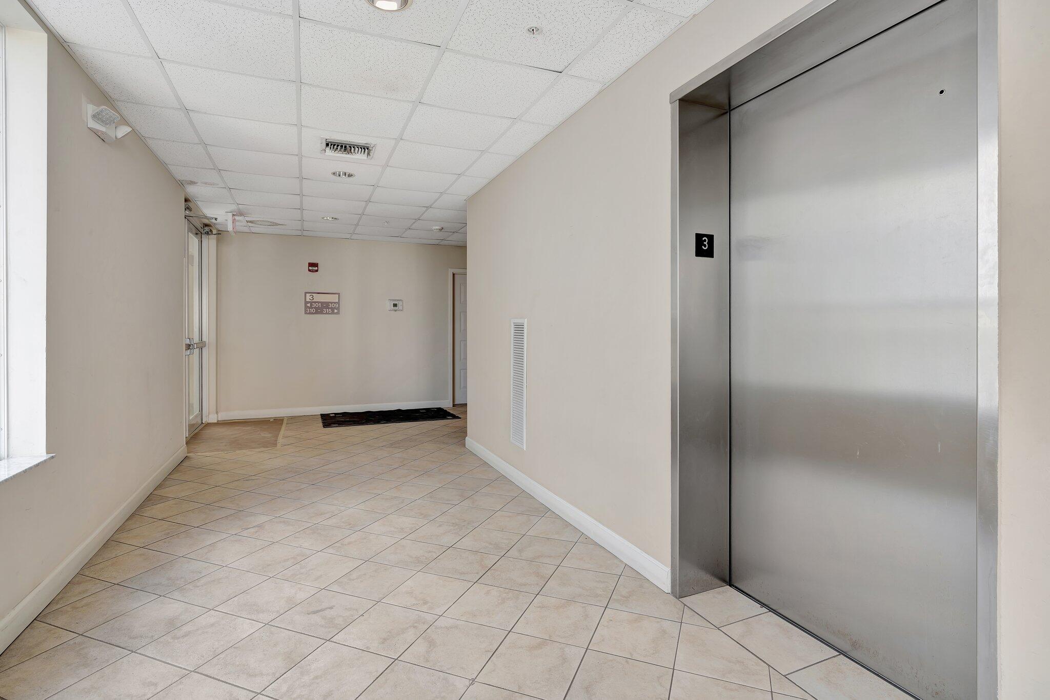 1209 Main Street, Unit 302 Jupiter, FL 33458 - Photo 31 of 40 a view of an empty room