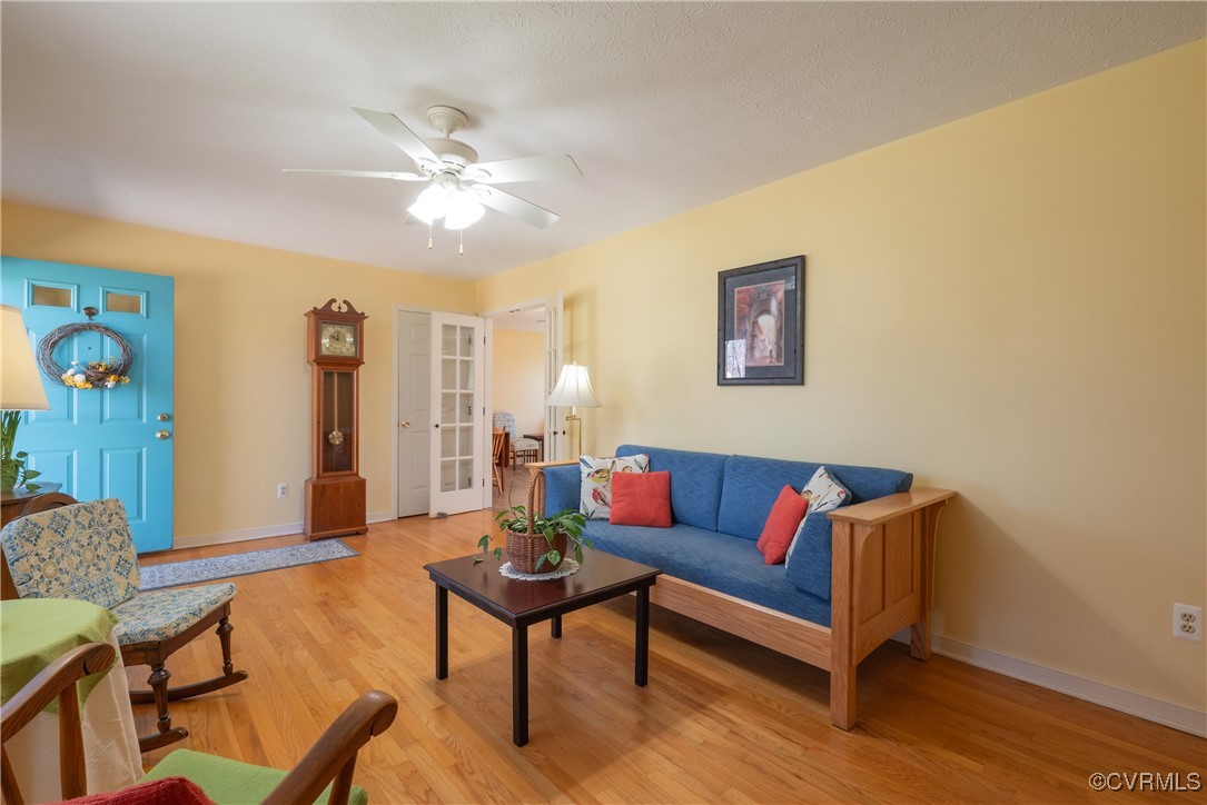 8009 Yolanda Road Henrico, VA 23229 - Photo 14 of 49 Living room featuring a ceiling fan, light wood-st
