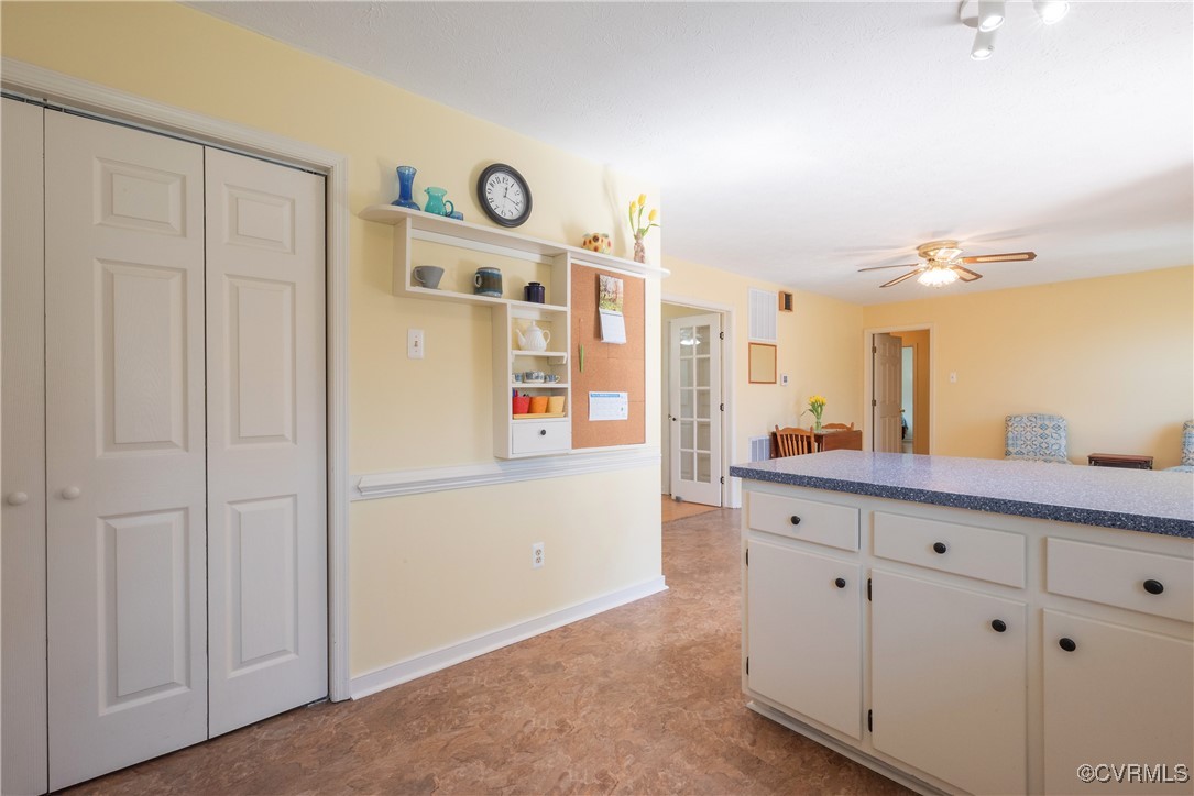 8009 Yolanda Road Henrico, VA 23229 - Photo 20 of 49 Kitchen featuring chair rail, a ceiling fan, and w