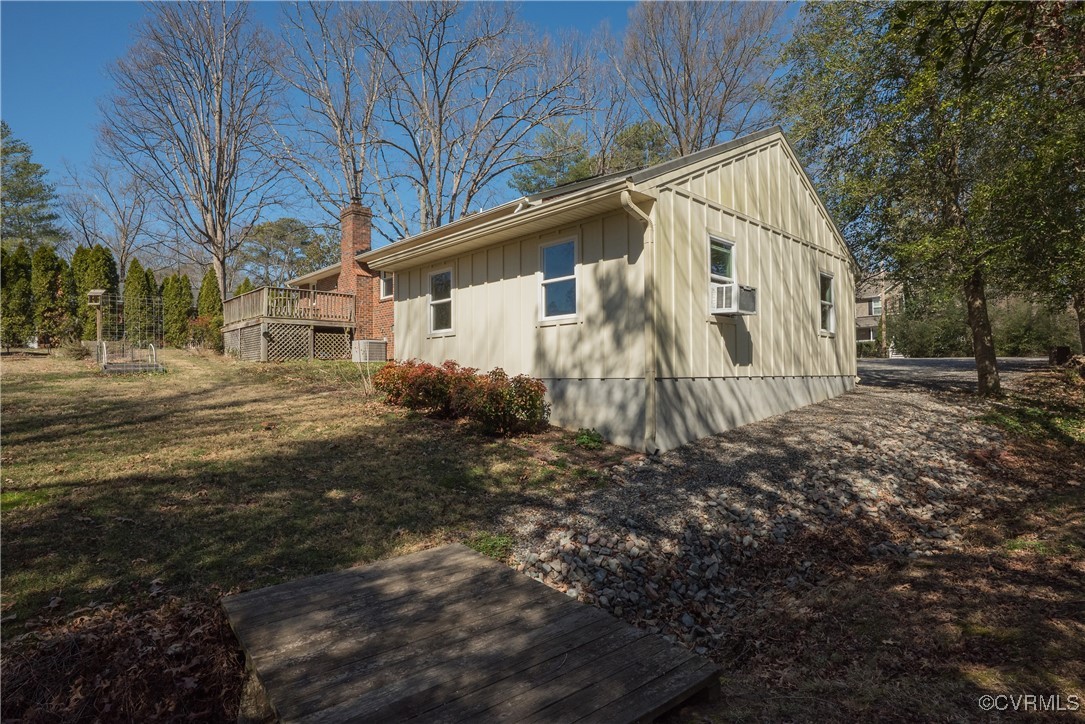 8009 Yolanda Road Henrico, VA 23229 - Photo 31 of 49 View of property exterior with a wooden deck, a ya