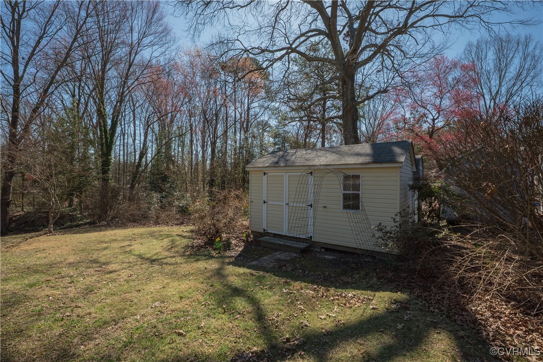 8009 Yolanda Road Henrico, VA 23229 - Photo 34 of 49 Yellow shed in backyard has electricity. Could be