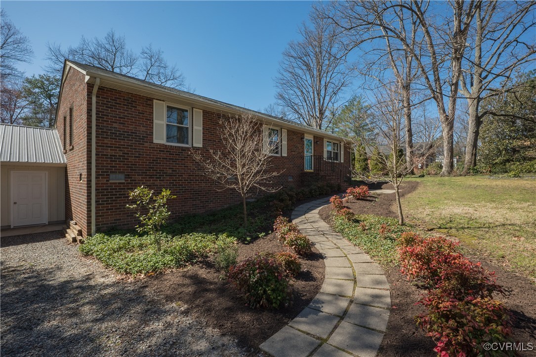 8009 Yolanda Road Henrico, VA 23229 - Photo 41 of 49 View of front of property featuring a front lawn a