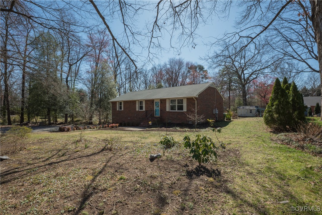 8009 Yolanda Road Henrico, VA 23229 - Photo 44 of 49 View of front of property featuring brick siding a