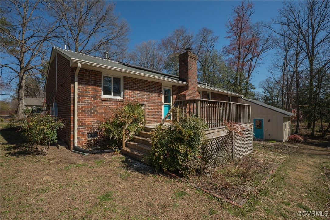 8009 Yolanda Road Henrico, VA 23229 - Photo 48 of 49 Back of house with brick siding, a wooden deck, a