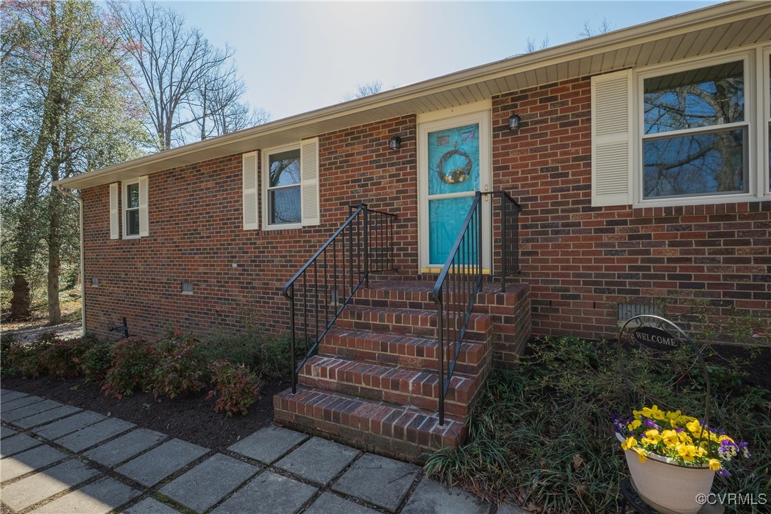 8009 Yolanda Road Henrico, VA 23229 - Photo 8 of 49 View of front of house featuring brick siding and