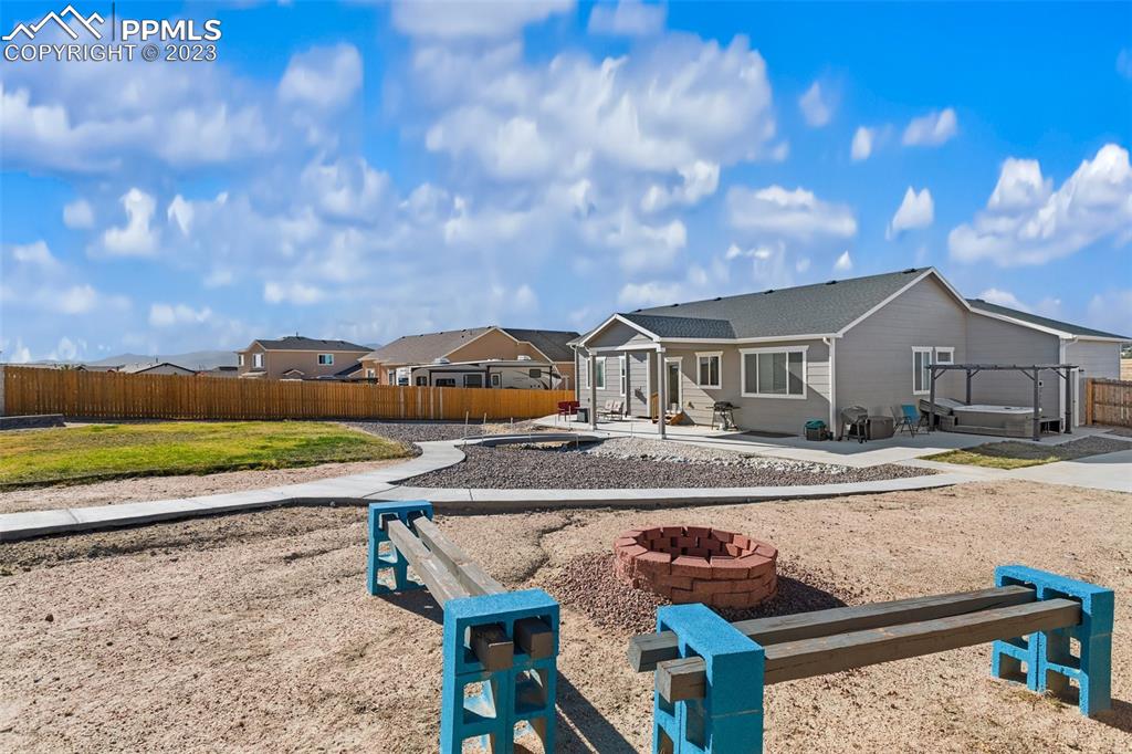 10095 Keating Drive Peyton, CO 80831 - Photo 27 of 31 a view of house with outdoor space and sitting area