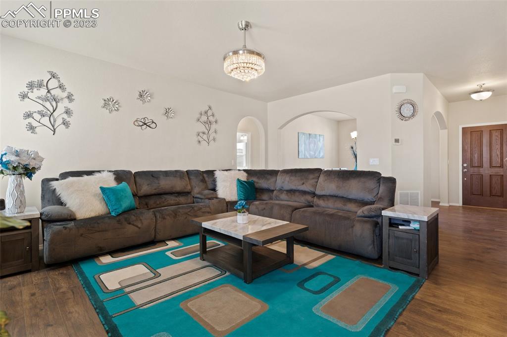 10095 Keating Drive Peyton, CO 80831 - Photo 3 of 31 a living room with furniture and a rug