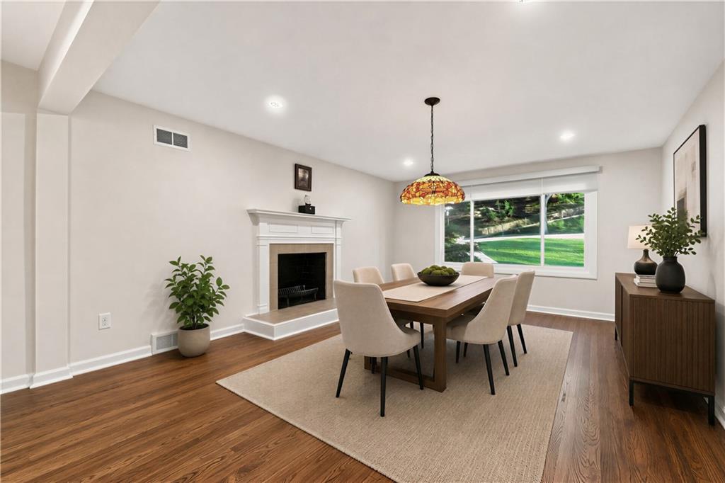 736 Pinetree Road Pittsburgh, PA 15243 - Photo 15 of 43 Spacious dinning room offers and abundance of light from the large picture windows. Photo is digitally staged.