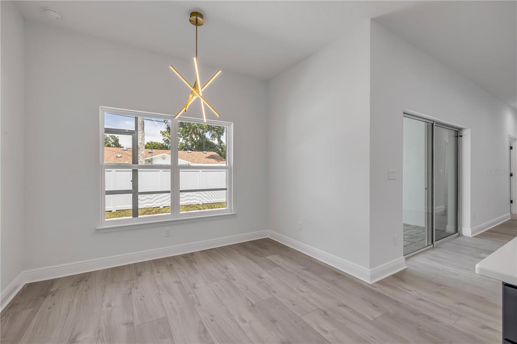 2324 Orange Tree Drive Edgewater, FL 32141 - Photo 25 of 59 a room that has a window in it