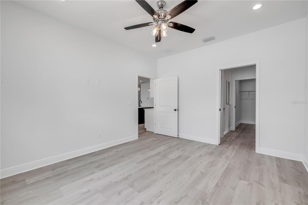 2324 Orange Tree Drive Edgewater, FL 32141 - Photo 29 of 59 wooden floor in an empty room