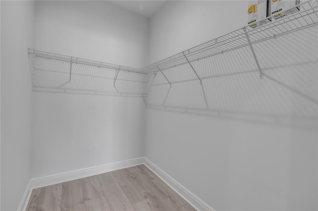 2324 Orange Tree Drive Edgewater, FL 32141 - Photo 34 of 59 a view of a room with racks on the wall