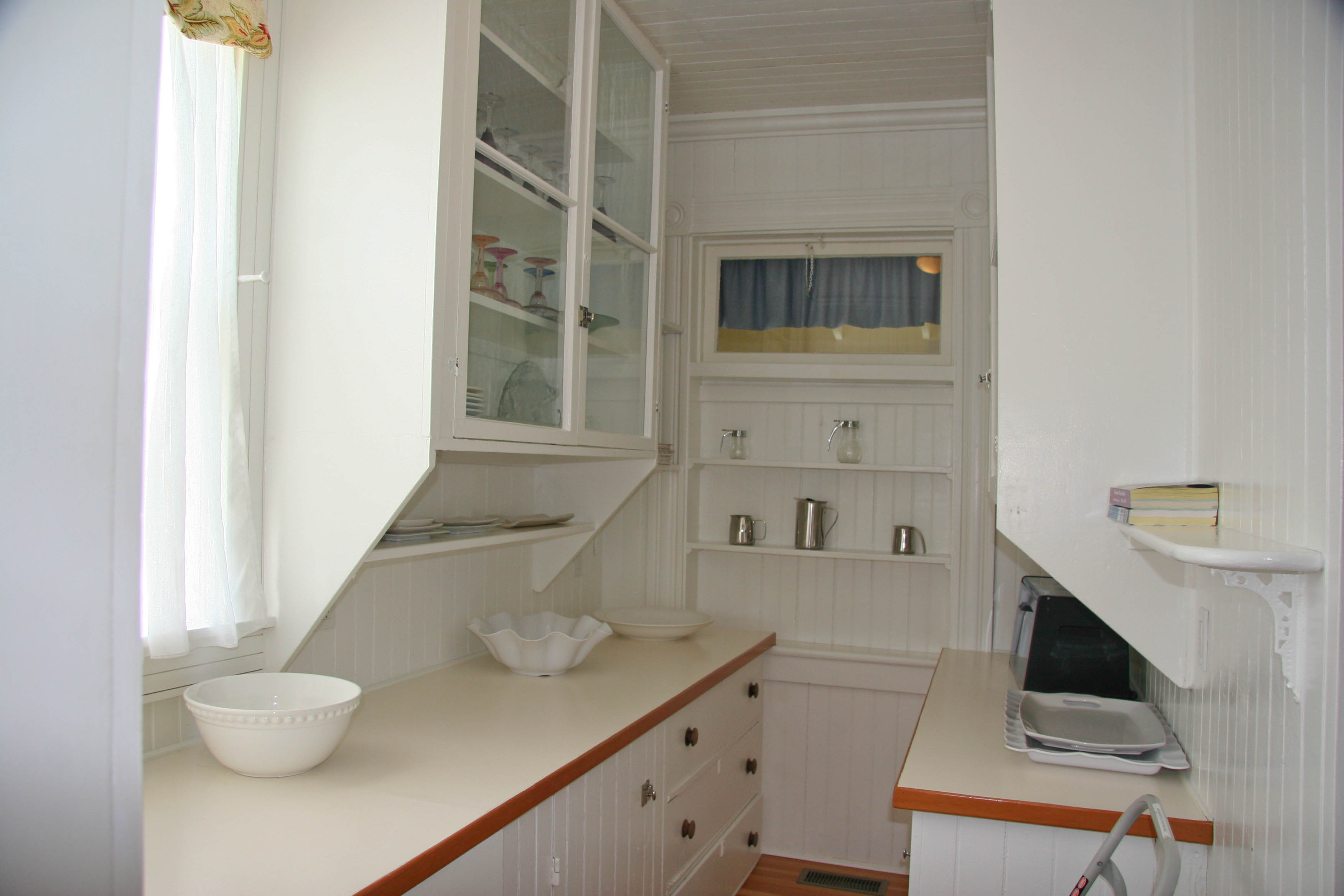 144 Surfside Road Nantucket, MA 02554 - Photo 7 of 46 a bathroom with a sink and a mirror
