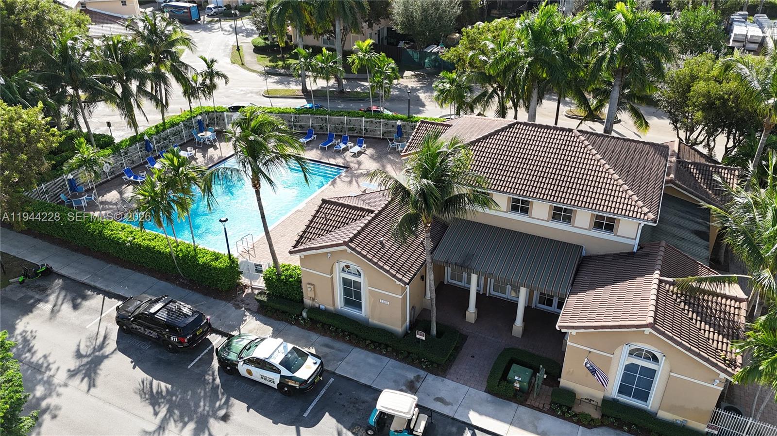 12476 Southwest 122nd Street Miami, FL 33186 - Photo 17 of 18 a front view of a house with garden