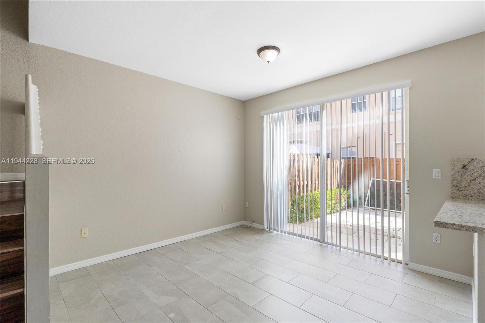 12476 Southwest 122nd Street Miami, FL 33186 - Photo 3 of 18 a view of entryway with floor
