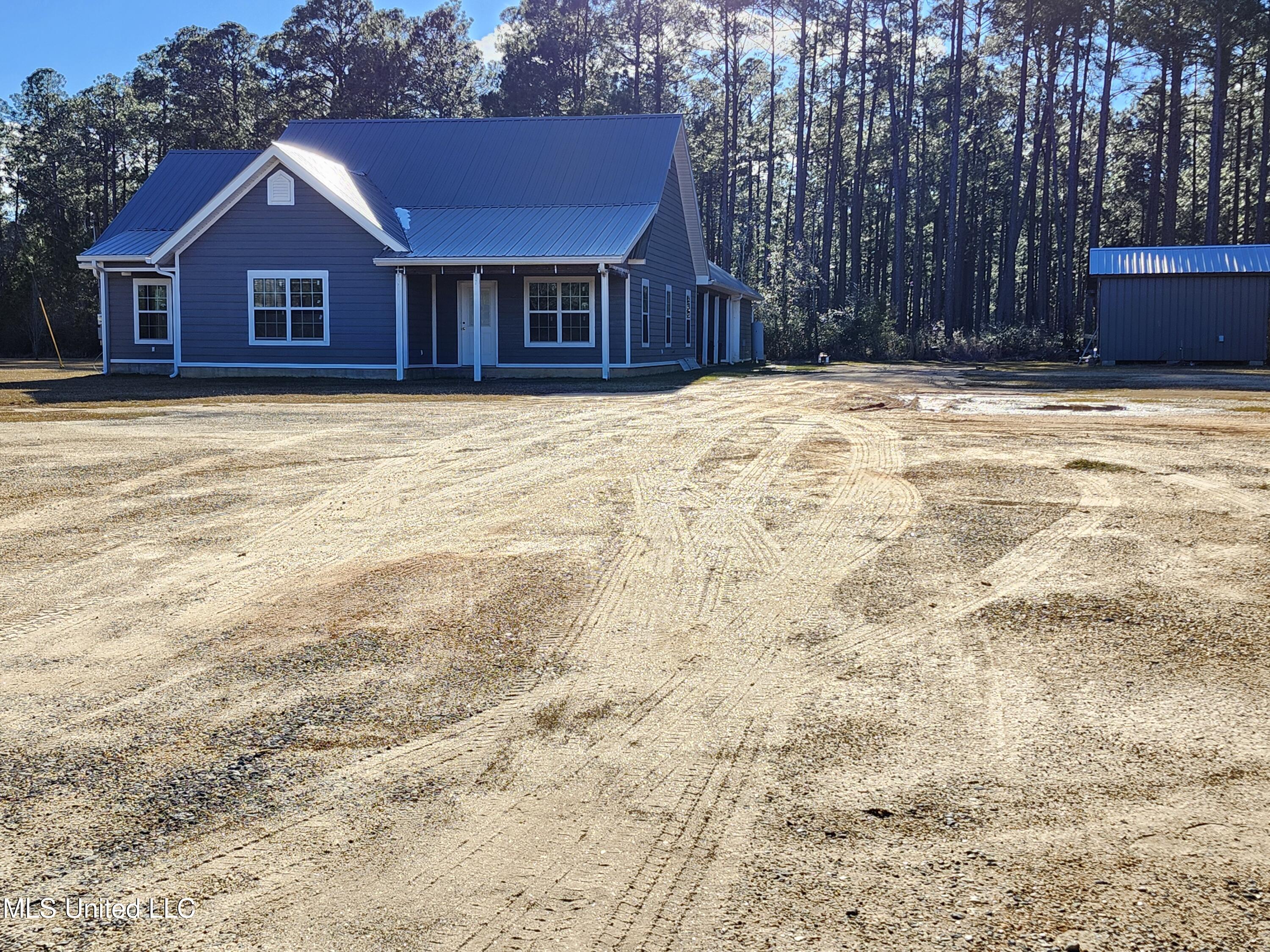 196 West McHenry Road Perkinston, MS 39573 - Photo 1 of 15 Front