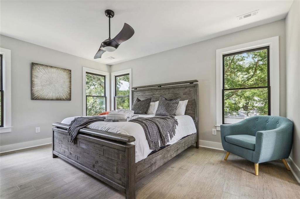 2145 Park Terrace Atlanta, GA 30337 - Photo 14 of 24 a bed sitting in a bedroom next to a window